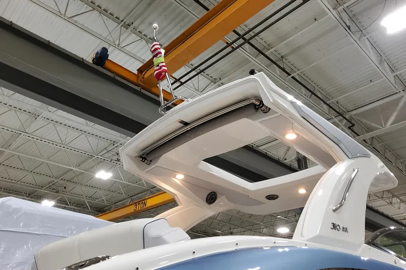  Yacht Photos Pics 2026 Formula 310 Bowrider OB in a factory setting, showcasing sleek design and modern features.