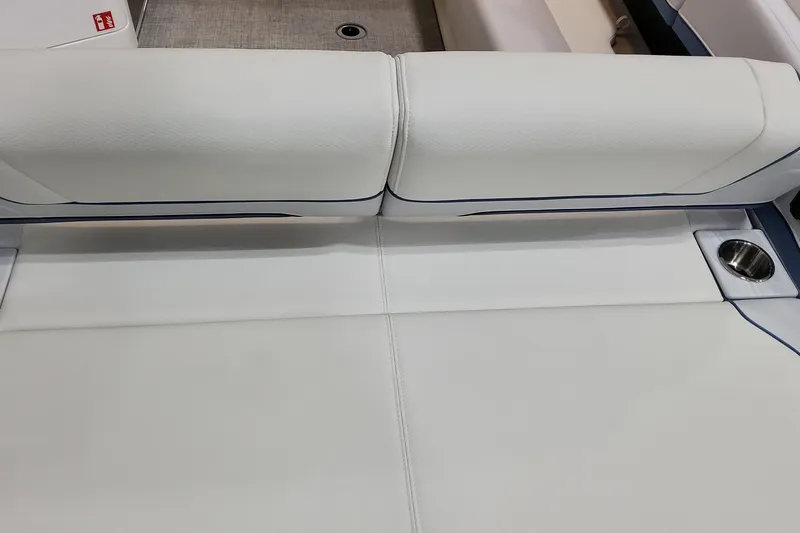  Yacht Photos Pics 2026 Formula 310 Bowrider OB interior with white leather seating and cup holder.