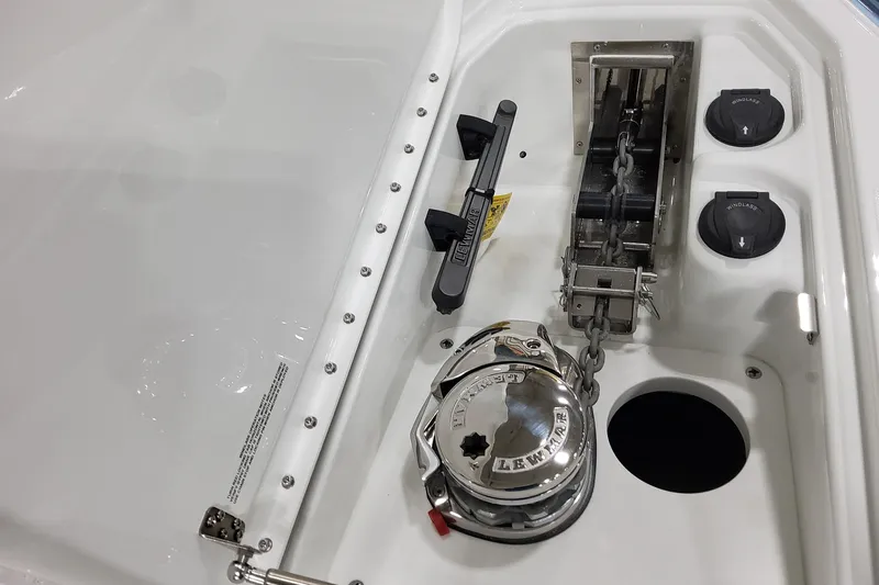  Yacht Photos Pics 2026 Formula 310 Bowrider OB anchor system with Lewmar windlass and chain mechanism.