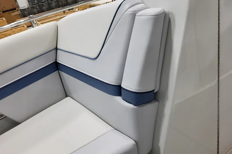  Yacht Photos Pics 2026 Formula 310 Bowrider OB interior seating with white and blue upholstery.