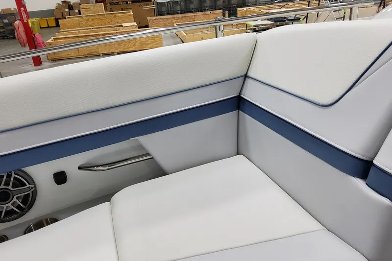  Yacht Photos Pics 2026 Formula 310 Bowrider OB interior with white and blue seating detail.
