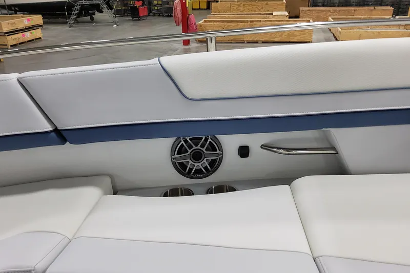  Yacht Photos Pics 2026 Formula 310 Bowrider OB interior with white seating and speaker detail.