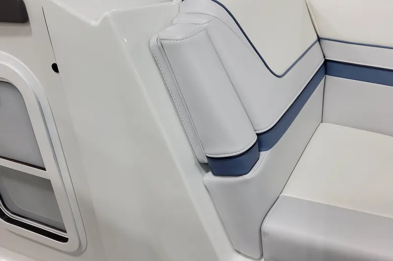  Yacht Photos Pics 2026 Formula 310 Bowrider OB interior seating with white and blue upholstery.