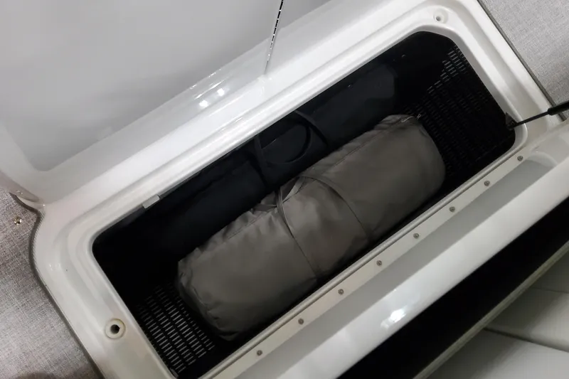  Yacht Photos Pics Open storage compartment in 2026 Formula 310 Bowrider OB boat.