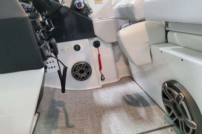  Yacht Photos Pics Interior of 2026 Formula 310 Bowrider OB boat, featuring control panel and speaker system.