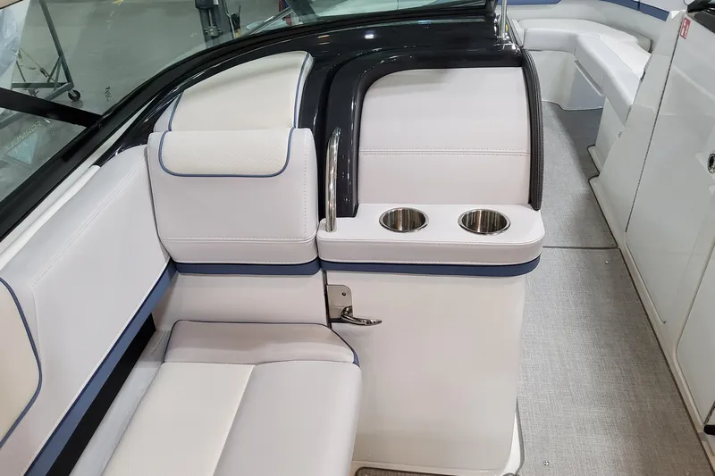  Yacht Photos Pics 2026 Formula 310 Bowrider OB interior with white seating and dual cup holders.