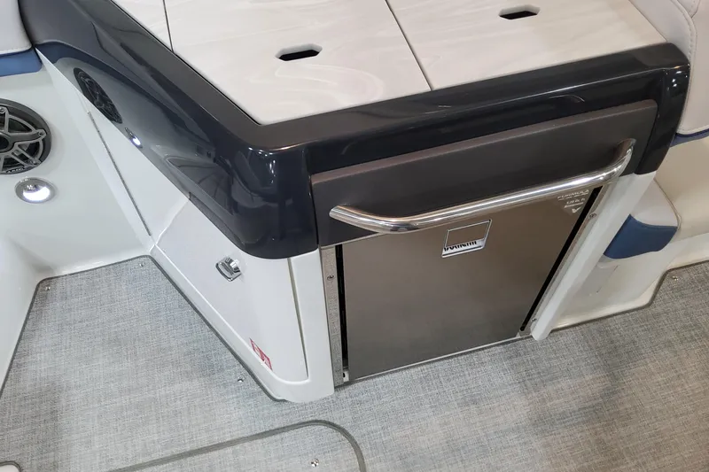  Yacht Photos Pics 2026 Formula 310 Bowrider OB interior with stainless steel refrigerator and modern design.
