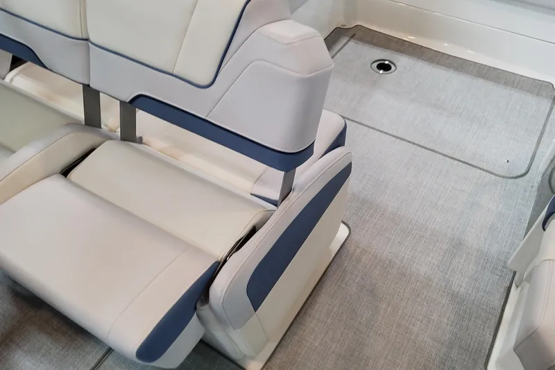  Yacht Photos Pics 2026 Formula 310 Bowrider OB interior seating with modern design and light upholstery.