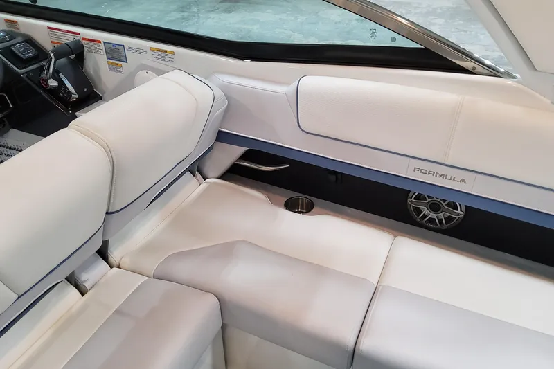  Yacht Photos Pics 2026 Formula 310 Bowrider OB interior with white seating and modern design.