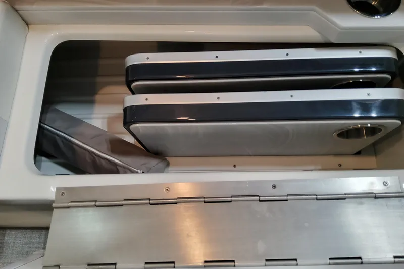  Yacht Photos Pics Storage compartment in 2026 Formula 310 Bowrider OB boat, featuring sleek design and functionality.