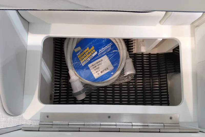  Yacht Photos Pics Storage compartment in 2026 Formula 310 Bowrider OB with marine electrical cable set.