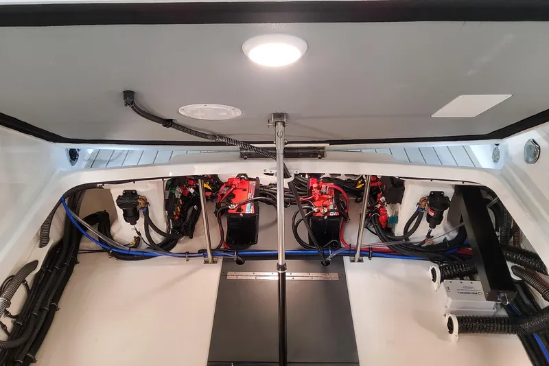  Yacht Photos Pics 2026 Formula 310 Bowrider OB engine compartment with wiring and components.