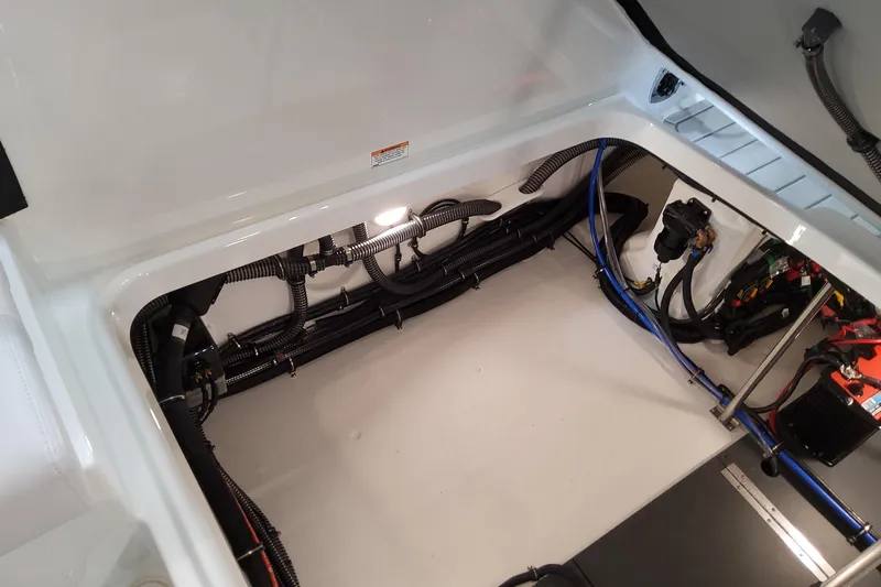  Yacht Photos Pics Engine compartment of 2026 Formula 310 Bowrider OB, showcasing wiring and components.