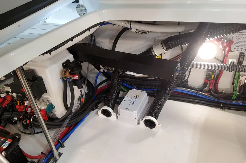  Yacht Photos Pics Engine compartment of 2026 Formula 310 Bowrider OB, showcasing wiring and components.