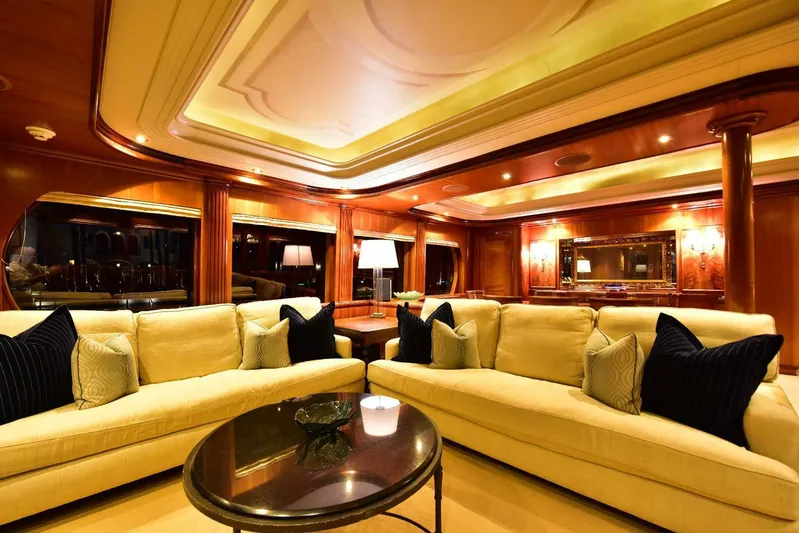 Waterford (name Reserved) Yacht Photos Pics Luxurious yacht interior with elegant sofas, warm lighting, and polished wood finishes, 2016 Sovereign model.