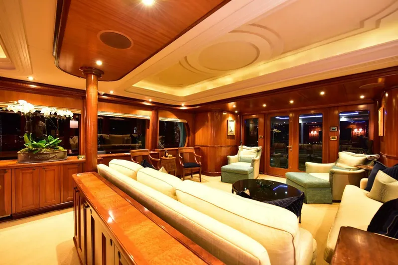 Waterford (name Reserved) Yacht Photos Pics Luxurious yacht interior with elegant wood paneling and plush seating, 2016 Sovereign Pilothouse.