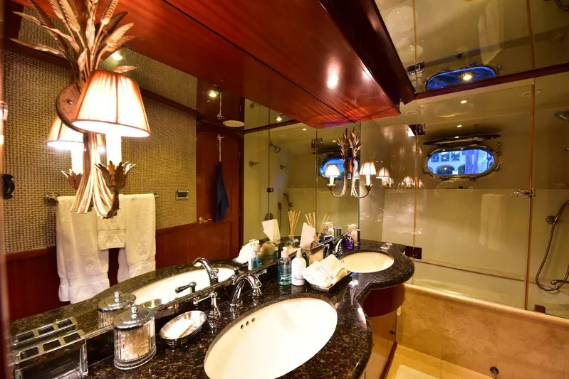 Waterford (name Reserved) Yacht Photos Pics Luxurious bathroom in 2016 Sovereign Pilothouse yacht with dual sinks and elegant decor.
