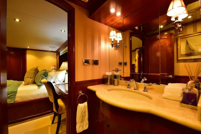 Waterford (name Reserved) Yacht Photos Pics Luxurious yacht interior with elegant bedroom and bathroom, Sovereign 2016 Pilothouse On-Deck Master.