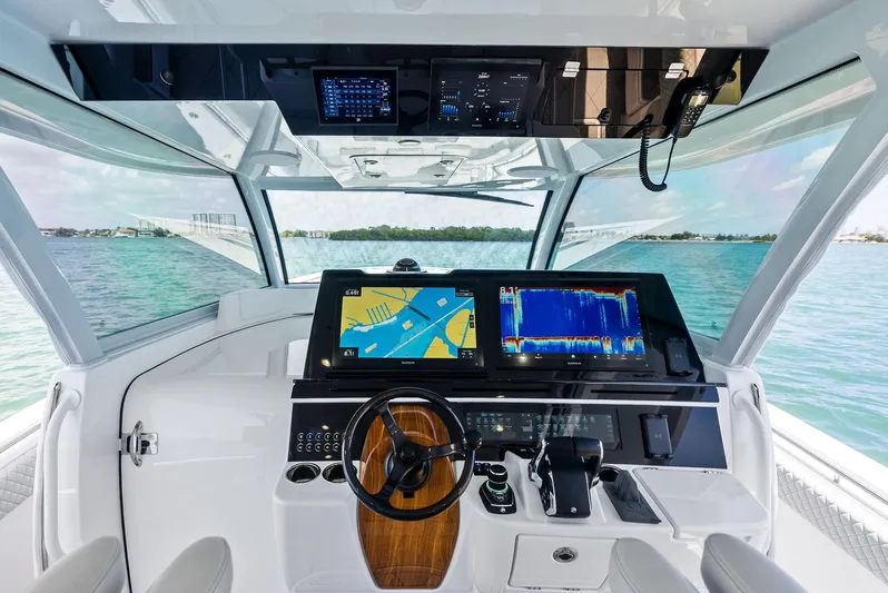  Yacht Photos Pics Helm of 2025 HCB 56' Sueños GIX yacht with advanced navigation displays.