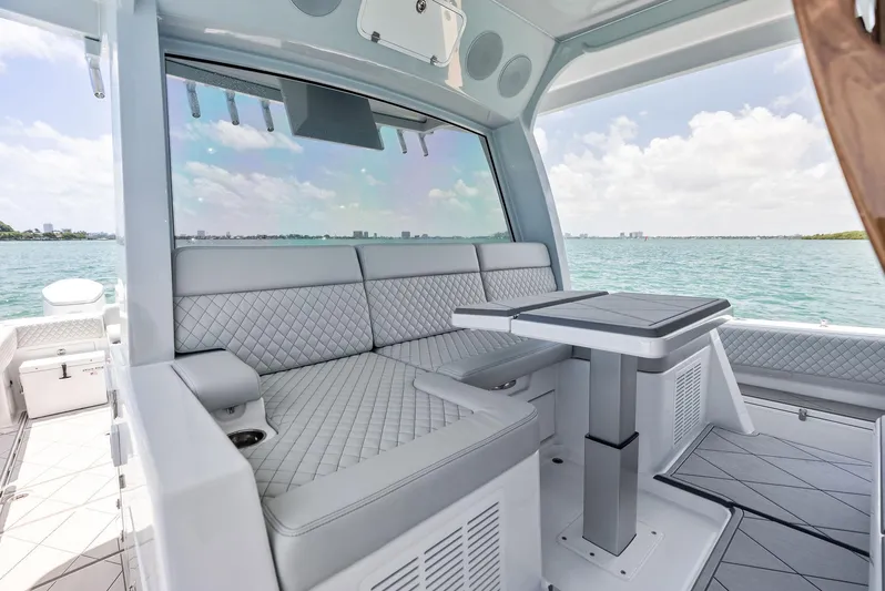  Yacht Photos Pics Luxurious seating area on 2025 HCB 56' Sueños GIX yacht with ocean view.