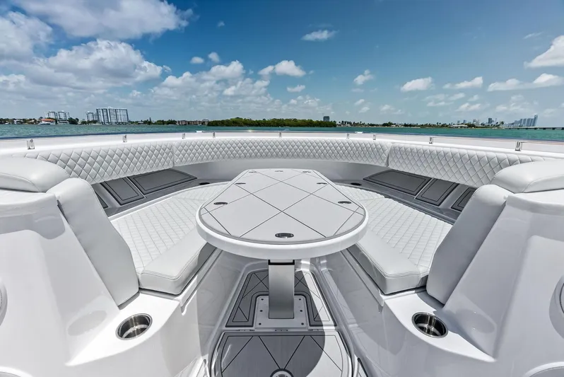  Yacht Photos Pics Luxurious seating area on 2025 HCB 56' Sueños GIX yacht with ocean view.