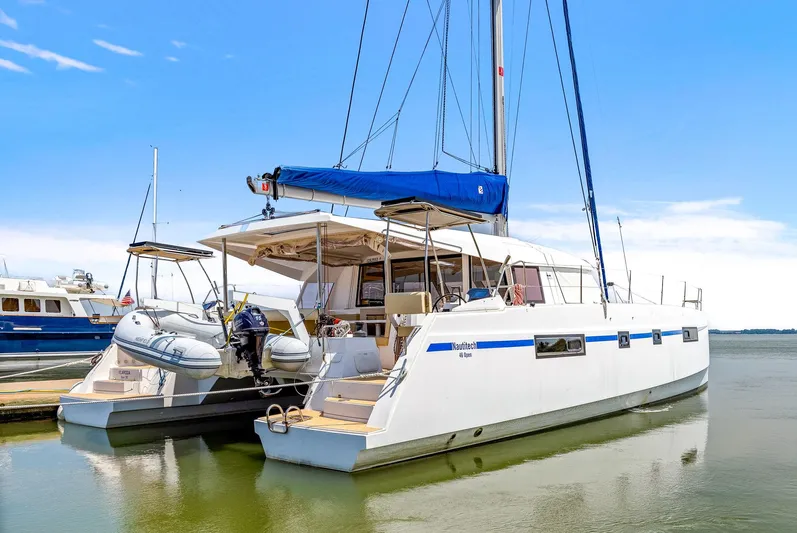 Vlaroda Yacht Photos Pics 2017 Nautitech 46 Open catamaran docked, featuring sleek design and spacious deck.