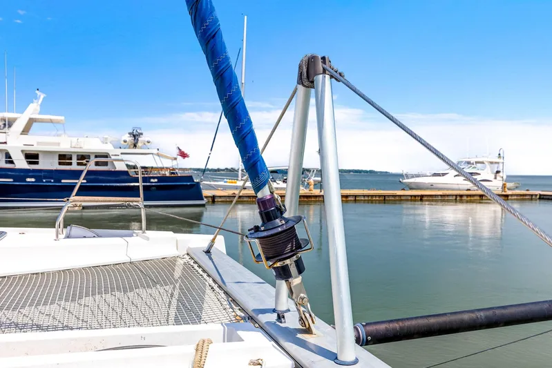 Vlaroda Yacht Photos Pics Nautitech 46 Open catamaran, 2017 model, docked in a marina with clear blue skies.