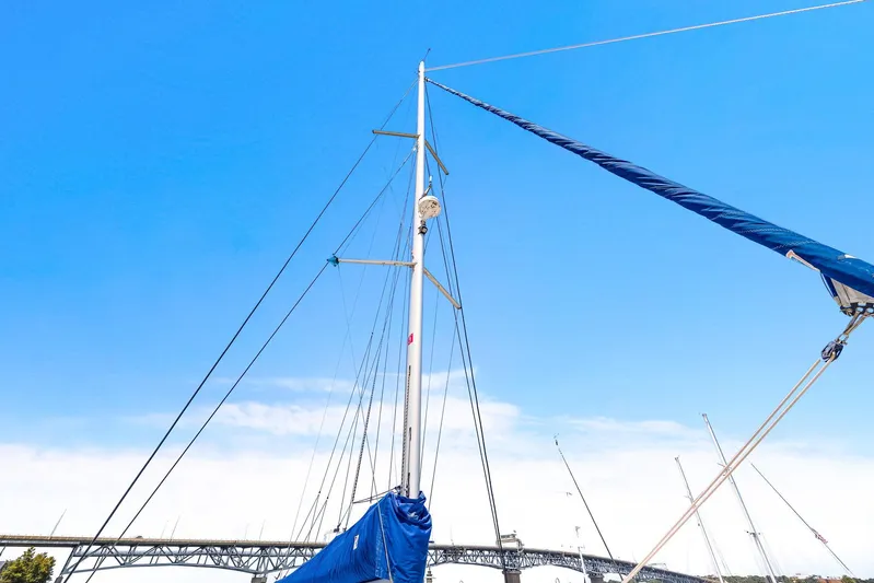 Vlaroda Yacht Photos Pics Sailboat mast of 2017 Nautitech 46 Open against clear blue sky.
