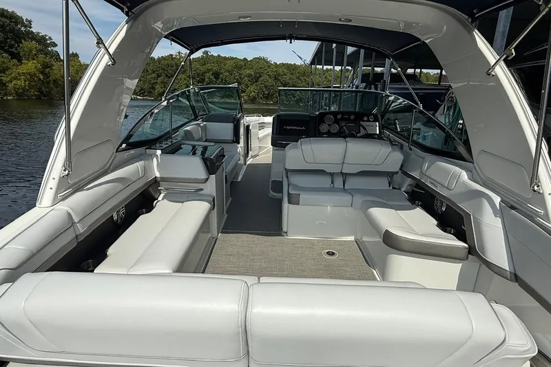  Yacht Photos Pics 2018 Formula 330 Crossover Bowrider with spacious seating and modern design on the water.