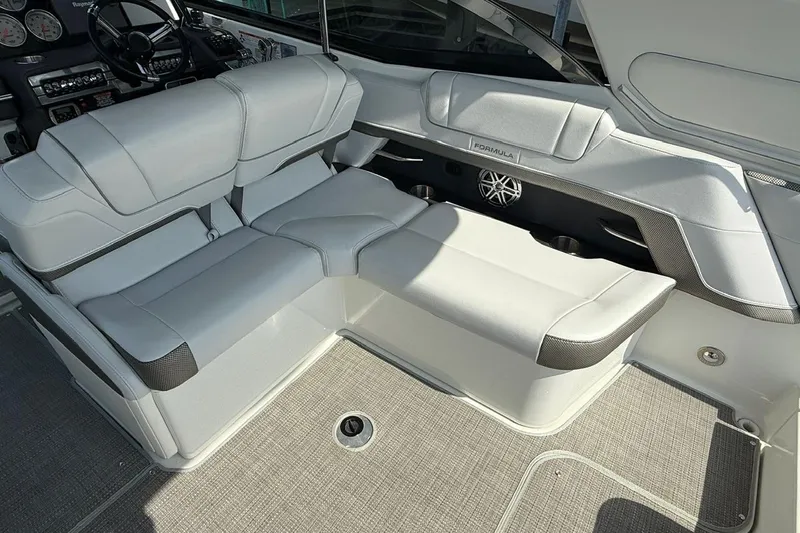  Yacht Photos Pics 2018 Formula 330 Crossover Bowrider interior with plush seating and modern dashboard.