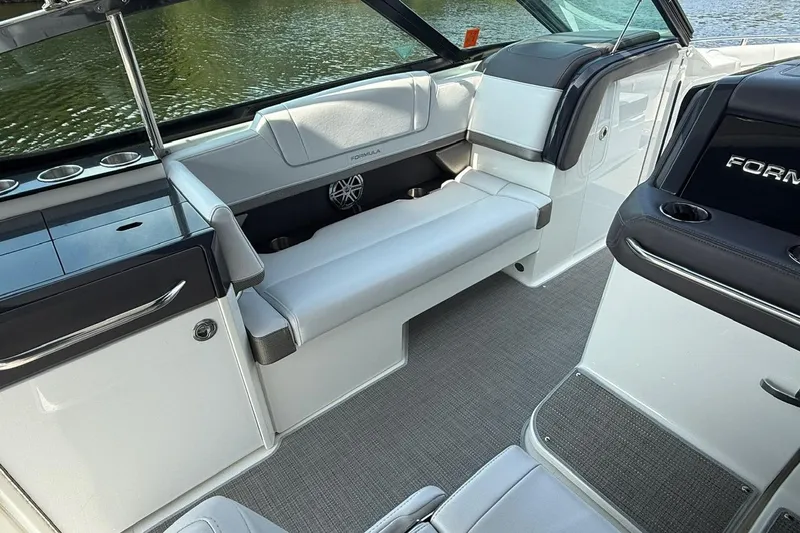  Yacht Photos Pics 2018 Formula 330 Crossover Bowrider interior with sleek seating and modern design.