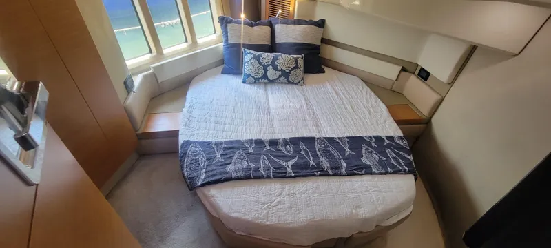  Yacht Photos Pics Luxurious bedroom in a 2013 Azimut 45 Flybridge yacht with elegant bedding.