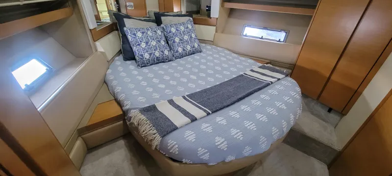  Yacht Photos Pics Luxurious bedroom in 2013 Azimut 45 Flybridge yacht with cozy bedding.