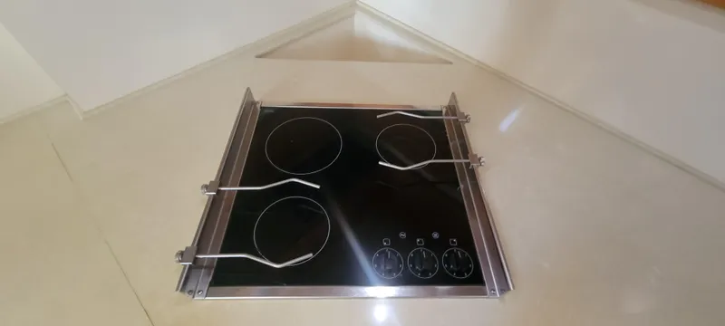  Yacht Photos Pics Stovetop on 2013 Azimut 45 Flybridge yacht kitchen counter.