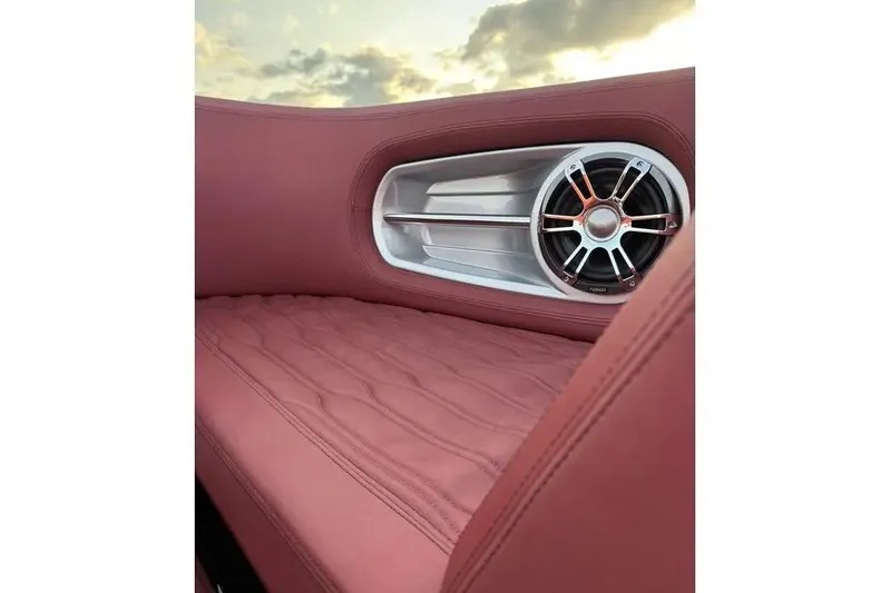  Yacht Photos Pics Luxurious interior of 2024 Cranchi E26 Classic with quilted seating and speaker detail.