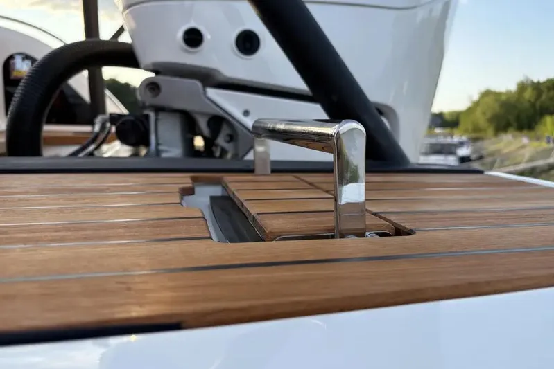  Yacht Photos Pics 2024 Cranchi E26 Classic boat with teak deck and chrome handle detail.