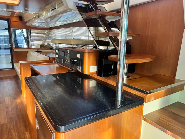  Yacht Photos Pics Luxurious interior of a 2016 Aquila 48 yacht with wooden finishes and modern design.