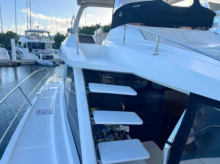  Yacht Photos Pics Aquila 48 yacht, 2016 model, docked at marina with sleek design and modern features.