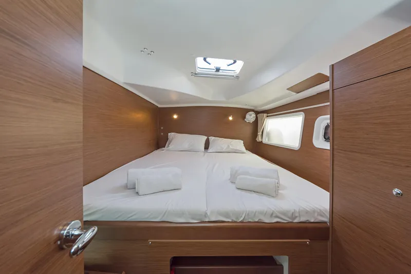  Yacht Photos Pics Interior cabin of 2017 Lagoon 380 S2 catamaran with cozy double bed.