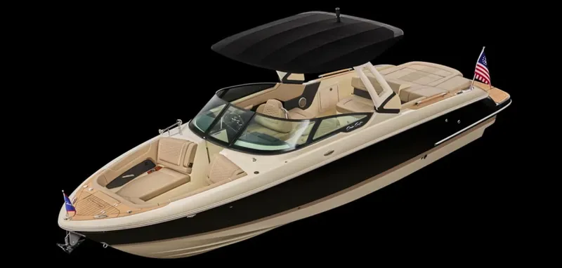  Yacht Photos Pics 2025 Chris-Craft Sportster boat with sleek design and American flag, black background.