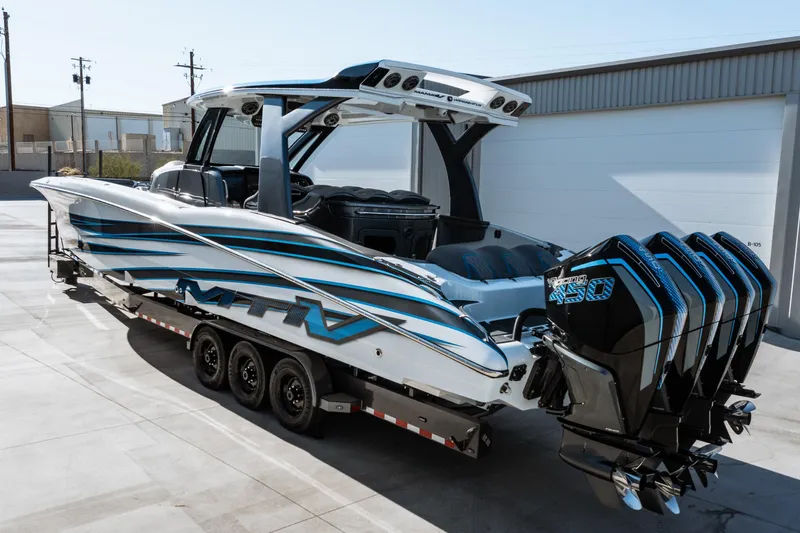  Yacht Photos Pics 2023 MTI V42 boat on trailer with quad outboard engines.