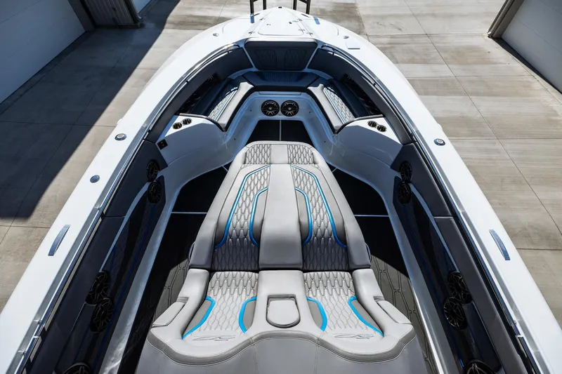  Yacht Photos Pics 2023 MTI V42 boat interior with modern seating and sleek design.