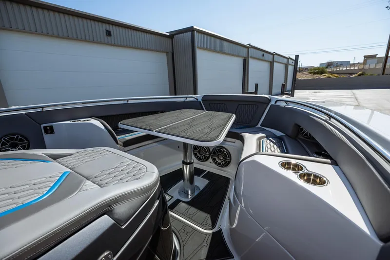  Yacht Photos Pics 2023 MTI V42 boat interior with seating and table.