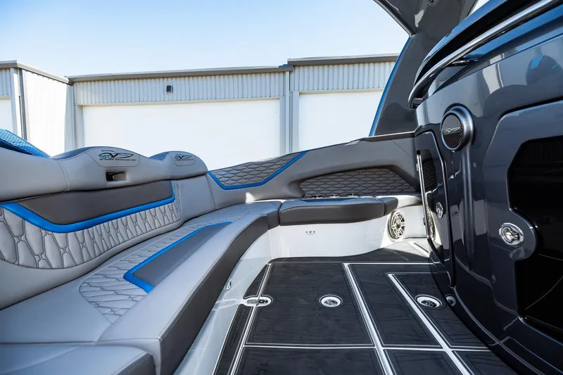  Yacht Photos Pics 2023 MTI V42 boat interior with luxurious seating and modern design.