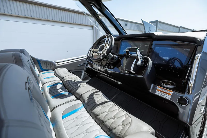  Yacht Photos Pics 2023 MTI V42 boat cockpit with modern controls and luxurious seating.