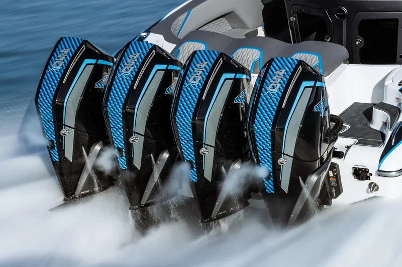  Yacht Photos Pics 2023 MTI V42 boat with four powerful outboard engines in action.