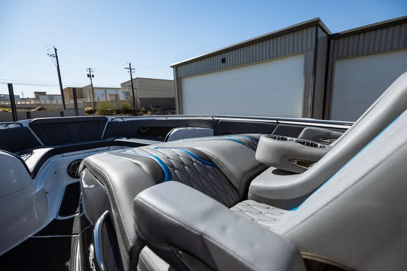  Yacht Photos Pics 2023 MTI V42 boat interior with luxurious seating and modern design.