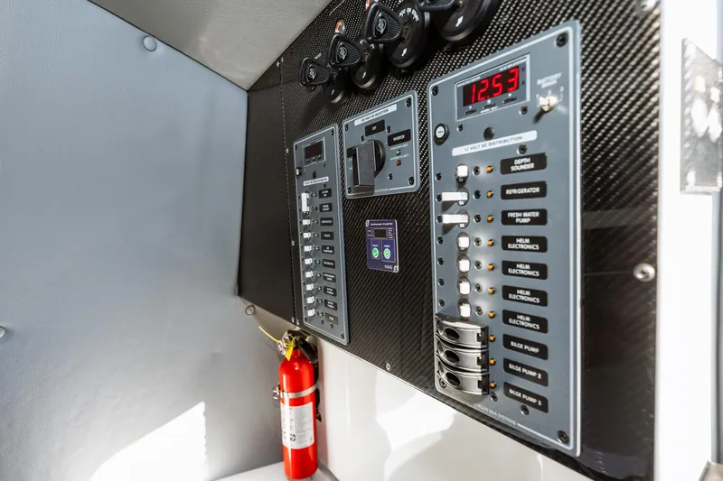  Yacht Photos Pics Control panel of 2023 MTI V42 boat with fire extinguisher.