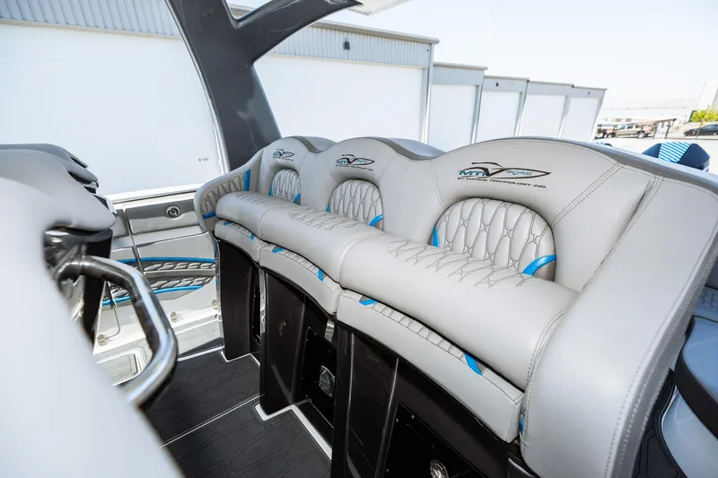  Yacht Photos Pics 2023 MTI V42 boat interior with luxurious seating.
