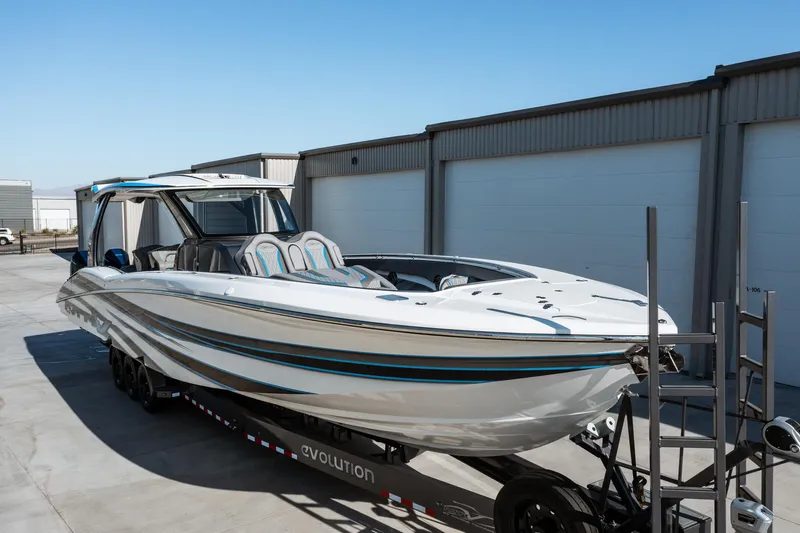  Yacht Photos Pics 2023 MTI V42 boat on trailer in storage facility.